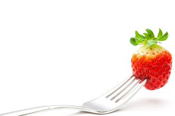 Erdbeere auf Gabel