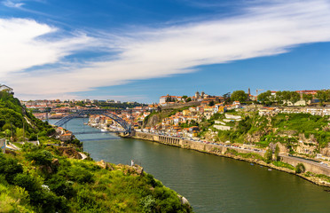 Fototapeta na wymiar View of Porto with the Dom Luis Bridge - Portugal