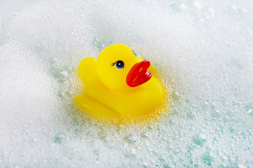 Rubber duck in foam close-up