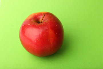 Apple on color background