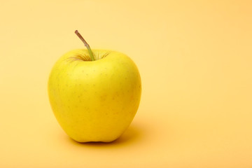 Apple on color background