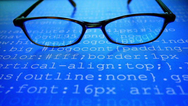 Glasses. Computer program codes running in a scrolling motion