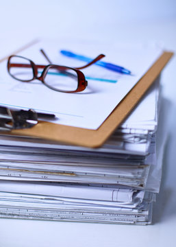Big stack of papers ,documents on the desk