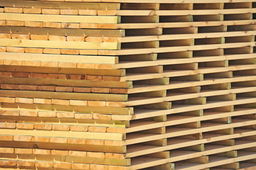 Wooden board for terrace, stacked at construction site