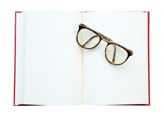 glasses on the open book. Isolated on white (clipping path)