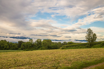 peak of a mountain between the clouds