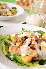 Caesar salad with griddled chicken and lettuce