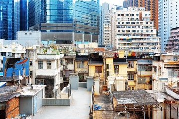 Old buildings coexist with modern skyscrapers in Hong Kong
