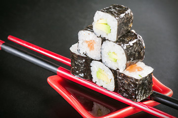 rolls on sticks with sauce