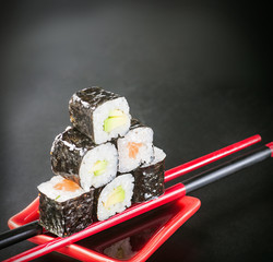 rolls on sticks with sauce