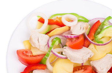 Warm meat salad with vegetables