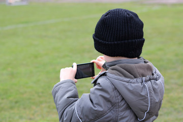 Little boy with mobile phone