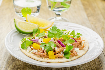 Tacos for lunch with chicken, pineapple salsa, purple onion and