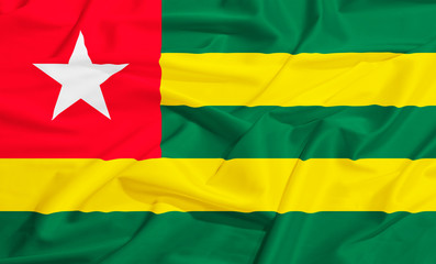 Togo flag on a silk drape waving
