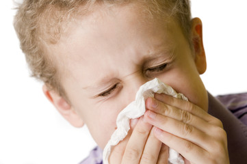 boy blow nose closed eyes
