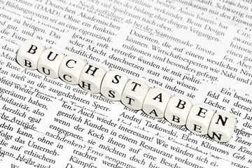 Fototapeta premium Buchstabenwürfel