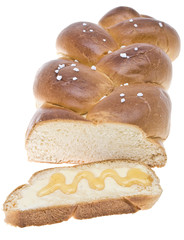 Weizenbrotscheibe (Hefezopf) mit Honig
