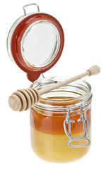 Glas Honig mit Honigheber