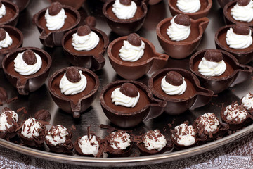 Chocolate Coffee cups with cream as dessert