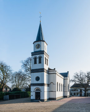 Small white plastered church in the Netherlands