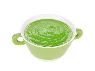 Broccoli cream soup on white.