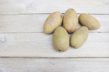 Sapodilla on a wooden table