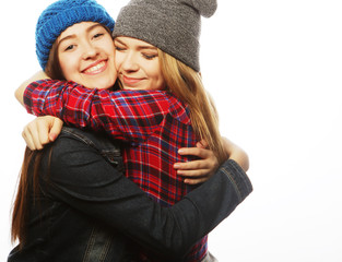 Two young girl friends  having fun.