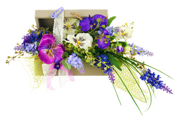 Bouquet from artificial flowers arrangement centerpiece in woode