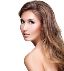 Fototapeta premium Photo of a beautiful sexy woman with long wavy hair