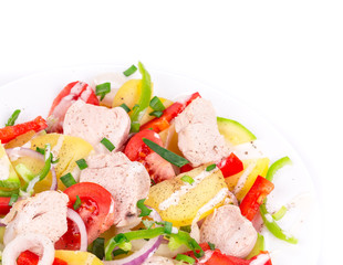 Chicken salad with potatoes and zucchini.