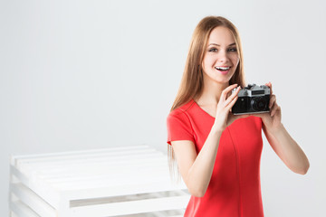 smiling girl with camera