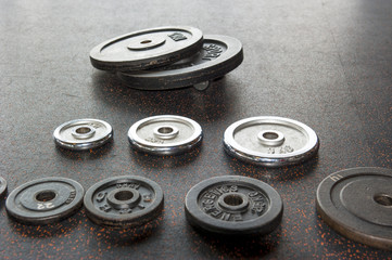 collection of dumbbell weight plates - 80681062