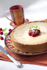 Coffee and cream cake with raspberries