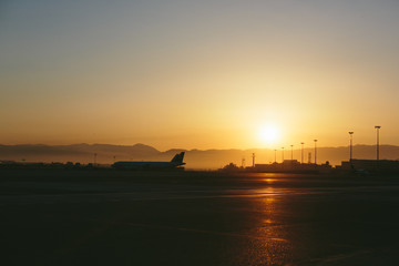 Naklejka premium the airport at sunset