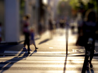 family walking at sun set in Paris with blur face