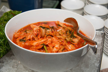 bowl of traditional Korean napa cabbage Kimchi.