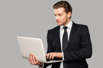 Businessman with laptop.