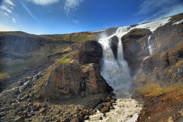 Waterfall in central mountain Iceland