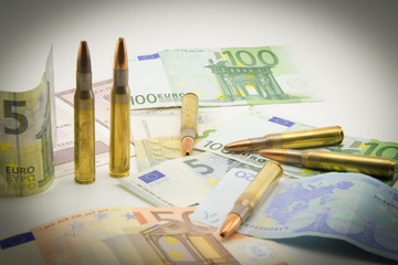 composition with bullets and euros