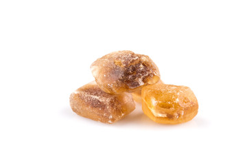 Brown caramelized lump cane sugar cube