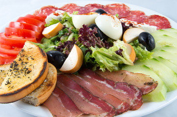 appetizer, entree of bacon, eggs and vegetables