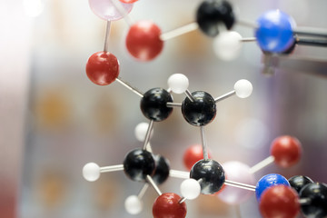 Molecular, DNA and atom model in science research lab