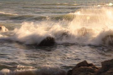 spray seawater on the coast, Italy
