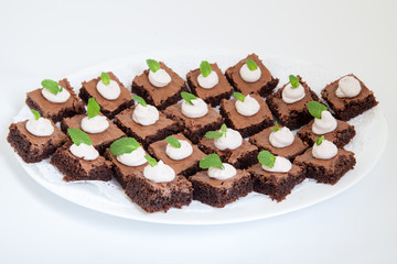 party platter with small chocolate cakes