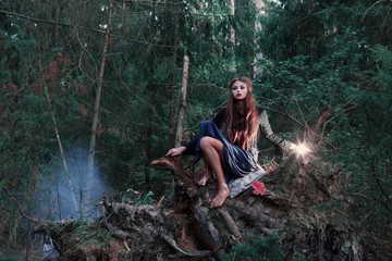Fototapeta premium beautiful witch in forest