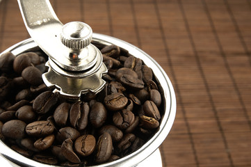 Coffee grinder on the table.
