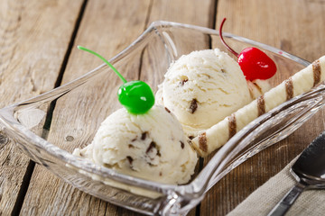 white ball of ice cream with chocolate chips