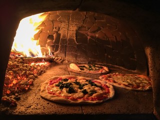 pizza in the wood oven