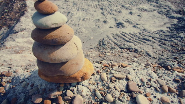 The movement of the camera upside down pyramid of stones on a