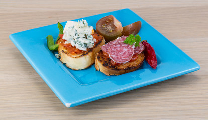 Tapas with cheese and salami